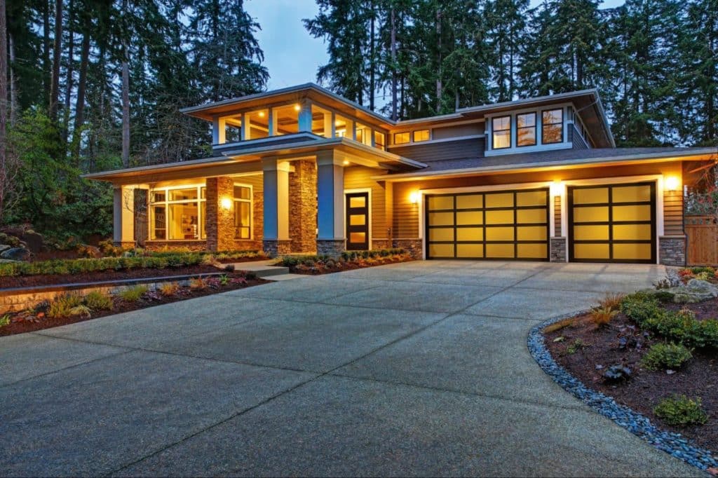 House with modern glass garage doors