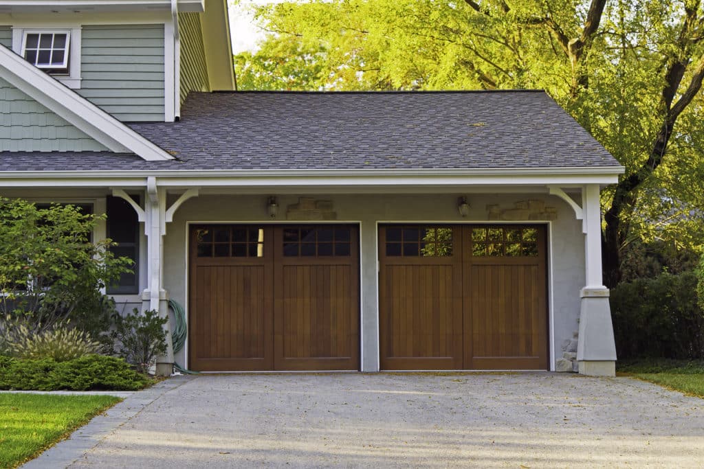 Two wooden car garage residence