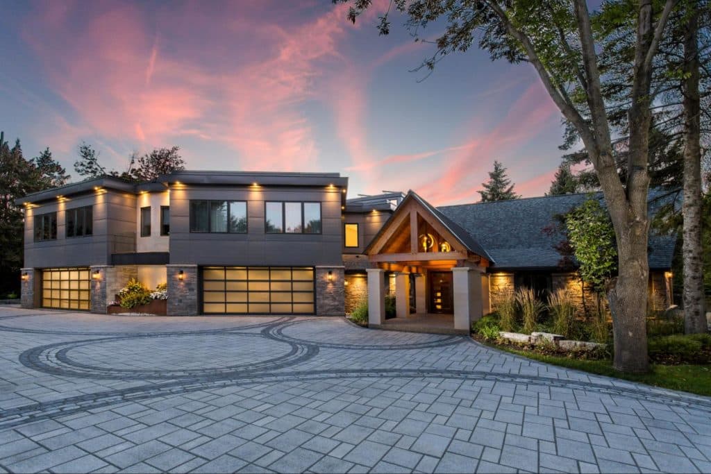 House with modern glass garage doors