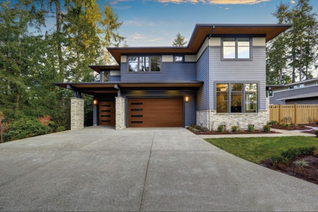 House with modern wood Garage Doors