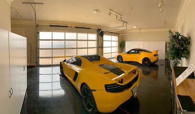 Two yellow Sports cars in garage