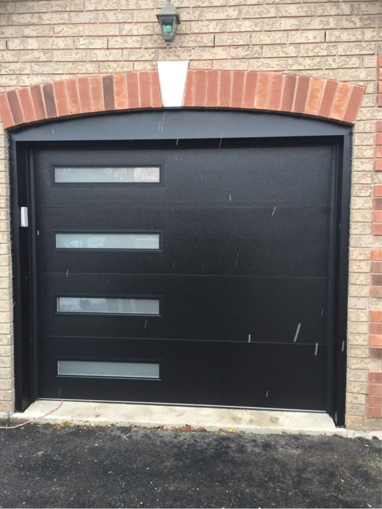 Black Modern Garage Door with windows down the side