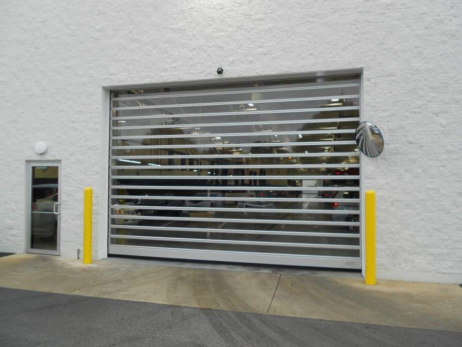 Rytec Spiral full view garage door installed at a Ford dealership in Barrie, Ontario