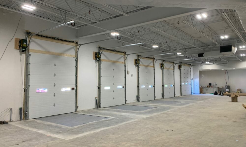 Commercial overhead doors with overhead door operators and safety bottom edge's