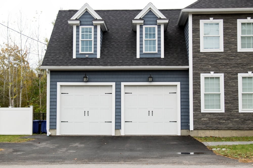 new vs repair garage door