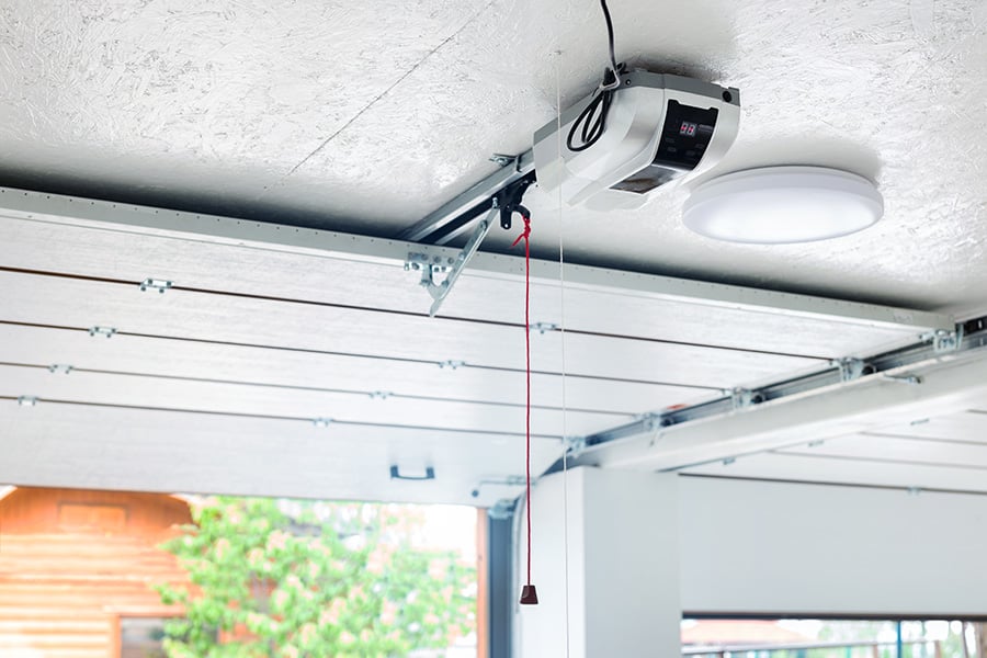 Garage door opener mounted on the garage ceiling