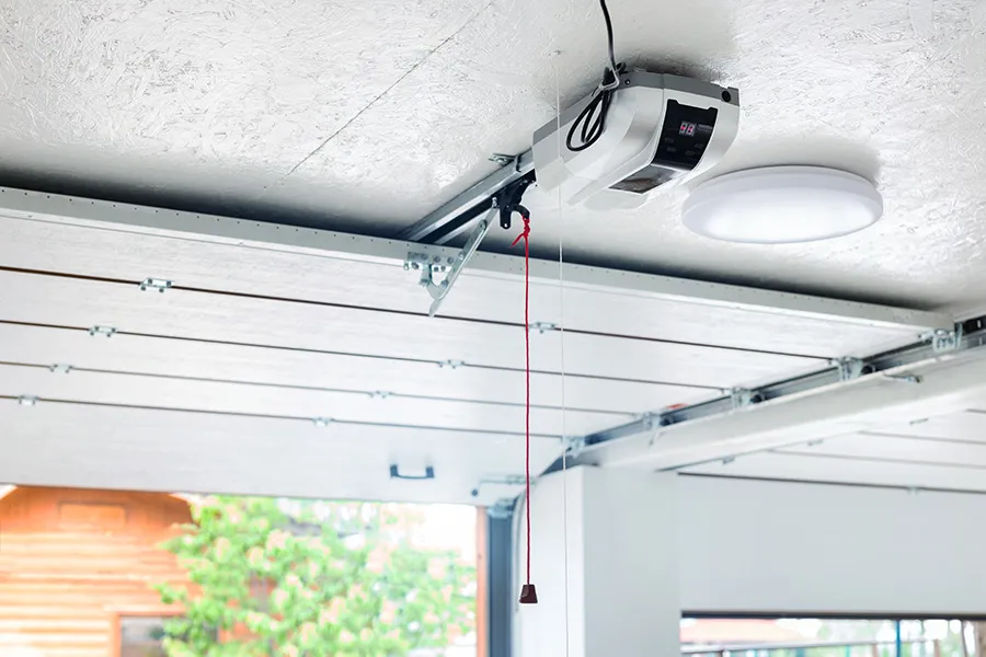 Garage door opener mounted on the garage ceiling